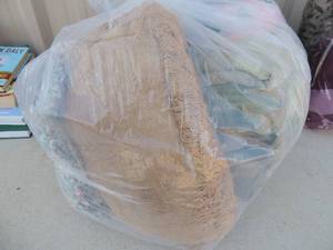 lot 58 image: Bag of throw pillows and blankets