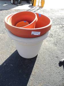 lot 76 image: 4 outdoor  planters  3 plastic and 1 ceramic