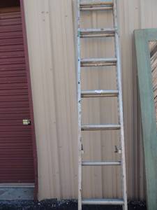lot 83 image: Extension ladder duty rating 200 lbs. 15 wide  16 total length