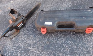 lot 96 image: Remington Pole Saw    &  Black and Decker Firestorm Saw in case