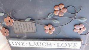 lot 98 image: 2 wall dcor- Live Laugh Love 26x3x1 and Metal Flowers 30