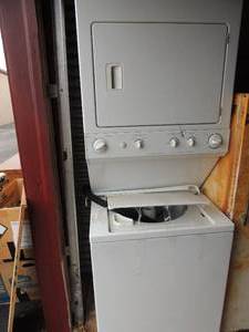 lot 4 image: Frigidaire stackable washer and dryer. Heavy duty super capacity 2 speed combo 74x27 26 deep works