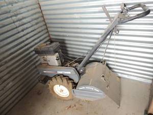 lot 10 image: Craftsman 5.5HP Tiller 17 cut needs new tires