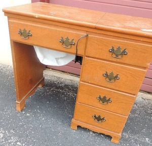 lot 105 image: Sewing table with New Home sewing machine,  drawers full of sewing treasures