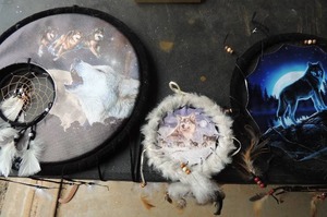 lot 114 image: 3 dream catchers with wolves 15 13 7 wrapped in black velvet