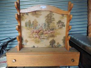 lot 119 image: GUN rack with deer background has drawer   34long 30tall