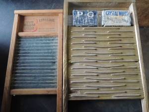 lot 126 image: Set of 2 Vintage Washboards -one is glass THE GLASS KING - LINGERIE 18 X 9 X 1 one has vintage soaps LABELS 23 X 12.5 X 2