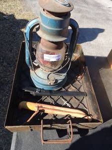 lot 197 image: Dietz #8  lantern  Small metal grill    12fillet knives in sleeves SwedenFinland  x 2