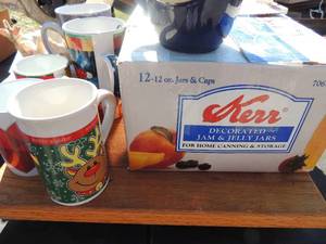 lot 200 image: Lot-Mugs, box of mason jars with lids, cutting board with drawer