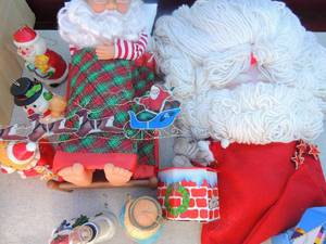 lot 208 image: Sleeping Santa,  Santa lounging, nativity scene and ornament