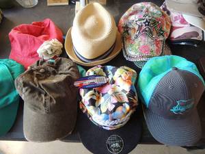 lot 215 image: Large lot of hats some with tags some with bling