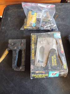 lot 242 image: 2 staple guns and a generous supply of staples