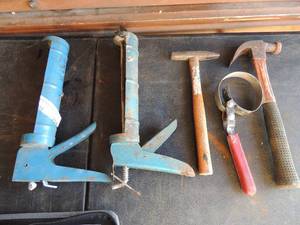 lot 254 image: Caulking guns and hammers