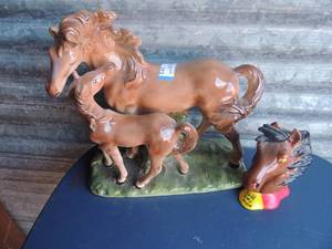 lot 313 image: Horse and colt statue no markings 14l 6w and 14t plus hand painted horsehead statue