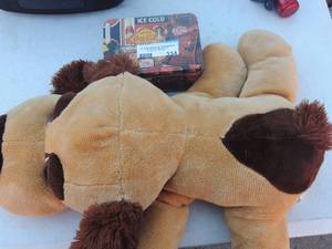 lot 334 image: Stuffed dog, coca cola tin box  with play childrens jewlery inside