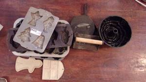 lot 11 image: Cast Iron Cooking Molds, Bundt Cake Pan and Cornbread Skillet