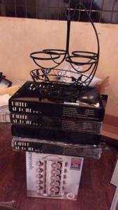 lot 15 image: Wire Fruit Holder, Dinner at home for 8 Boxes (most unopened), 20 Jar Revolving Stainless Steel Spice Rack