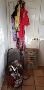 lot 42 image: Aprons, Laundry Hampers, Framed and Painted Metal Laundry Art, Metal Wire Dress Wall Hanger