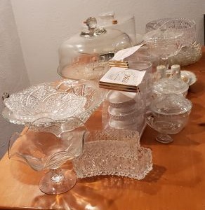 lot 48 image: Two Cake Plates with Lids, American Atelier Bianca Cupcake Pedestal Plates, 50th Anniversary Salt & Pepper Shakers and Plates, and Assorted Glass and Crystal Bowls
