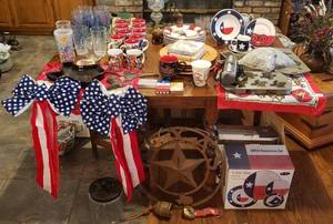 lot 84 image: Texas Lot Two 20 pc. Dinnerware Sets, Cast Iron Texas Molds, Texas Coffee Mug Set, and More, see pictures