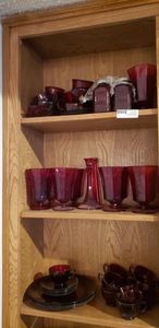 lot 91 image: Red Glassware includes red glass salt and pepper shakers