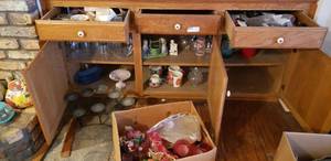 lot 74 image: Contents of Cabinet and Drawers as shown with Metal Column Candle Holder and Box of Wax