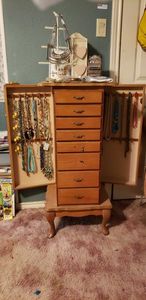 lot 244 image: Jewelry Armoire (a couple handles and broken) and Jewelry as shown