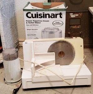 lot 199 image: Braun Coffee Bean Grinder, Oster Food and Meat Slicer, Cuisinart Fozen Yogurt-Ice Cream and Sorbet Maker Model ICE-20