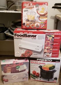 lot 204 image: Food Saver Bag Vac by Tilia, Chef Basket, Presto 6-Qt. Kitchen Kettle, Revolving Cake Stand