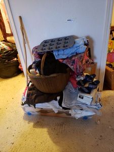 lot 261 image: Misc. Lot Includes Rolling Luggage Bag, Basket and Clothes