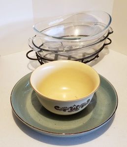 lot 215 image: Anchor Clear Casserole Dish with Metal Holder, Pfaltzgraff 2 Qt. Mixing Bowl, Hausenware Green Bowl