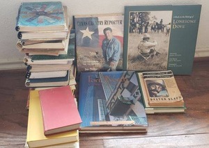 lot 69 image: Texas Books and Recipe Books as shown. Includes A Book on the Making of Lonesome Dove, Texas Wildflowers, Texas Country Reporter