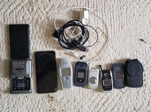 lot 139 image: Cell Phones, Chargers and Small Phone Case, see Pictures Includes Iphone, working conditions unknown