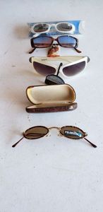 lot 336 image: Sunglasses still with Tags, Includes Polarized Foldable Shades with Case, Foster Grant, and Reading Sunglasses