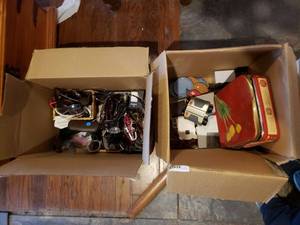 lot 104 image: Box of Eyeglasses and Sunglasses and Misc. Box of Coasters, Nightvision Goggles and more