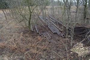 lot 814 image: Large lot of piping double wall drilling pipe, and steel cabling.