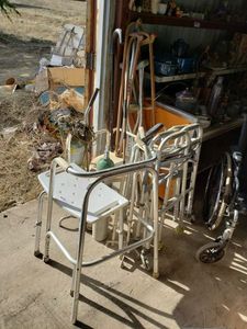 lot 400 image: Wheelchair, Folding Walkers, Canes, Victor Oxygen Tanks, Portable Potty Seat