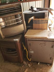 lot 402 image: 4 GasLP Heaters Dearhorn, and Friedrych Window AC Unit (Working Conditions Unknown)