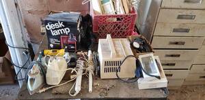 lot 471 image: Desk Lamp, Iron, Curling Irons, Blood Pressure Cuffs and Phones as shown