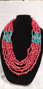 lot 740 image: Turquoise and coral chip bead multi strand (6) graduated necklace. 34L (longest) to 28L (shortest) with 2 extender.