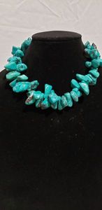 lot 755 image: Dyed Green Howlite bead necklace. Shepherds crook clasp. 14-15L