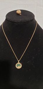 lot 760 image: Gold filled necklace with encased gold flake pendant with rope design border and gold filled baseball charm engraved 64.