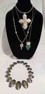 lot 763 image: Silver plate and Tibetan silver Necklaces 4 ct. None stick to a magnet except ball bead chain.