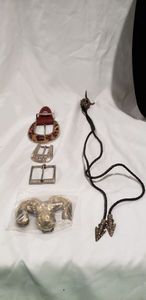 lot 772 image: Western lot - Hide skin belt buckle, Skull bolo tie, Ram 1978 bar Buckle 9unopened)plus