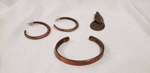 lot 722 image: Copper Magnet Cure bangle and pair of copper hoop earrings Plus 1 extra hammered copper earring