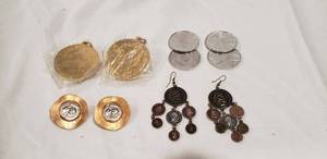 lot 727 image: Coin jewelry. Includes 2 vintage Caesars Palace necklaces (still unopened), (4) Krewe of Caeser 1978 Mardi Gras Coins, Brass and coin clip earrings and French coin earrings