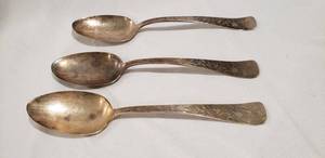 lot 733 image: Sterling serving spoons. Marked Sterling with Backward J and regent lion. Unknown maker. (X the money)
