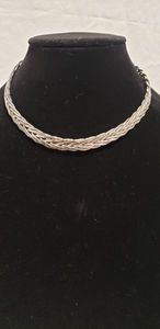 lot 738 image: Sterling silver (unmarked) omega choker with braided design.