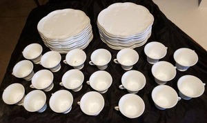 lot 223 image: Large Lot of Milk Glass Tea Plates and Cups with Grape Design - Set of 20