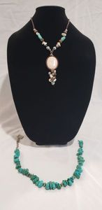 lot 704 image: Gemstone duo. Includes Sissy & Me genuine turquoise necklace with hanging tag (missing clasp) 14L and leather turquoise and agate stone necklace 16L